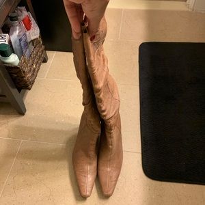 Ladies leather camel color leather heeled boots.